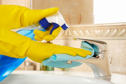 Room-by-room house cleaning in a bright living space