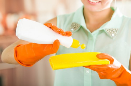 Professional house cleaning service preparing a clean home